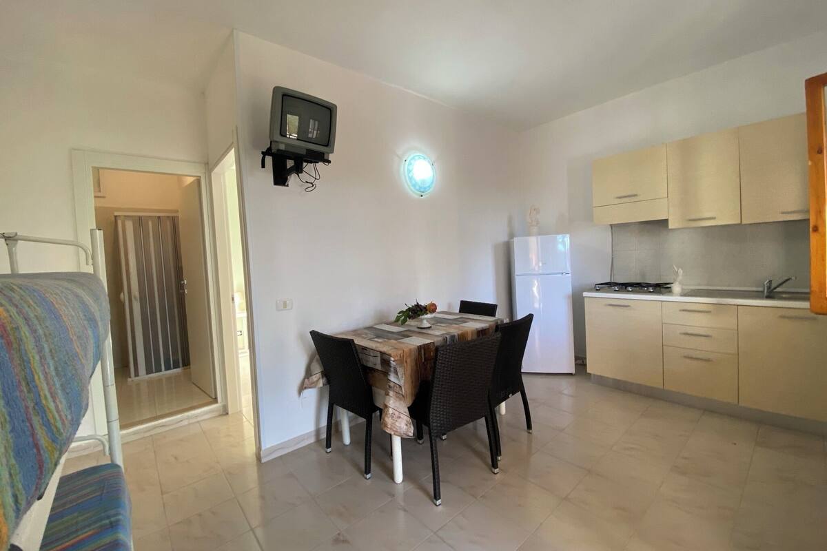 Apartment, 1 Bedroom (4 PAX) | Living area | Flat-screen TV