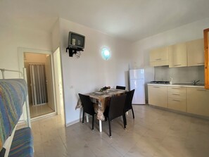Apartment, 1 Bedroom (4 PAX) | Living area | Flat-screen TV - Residence gli stingi (Vieste)