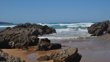 Beach nearby, white sand, 15 beach bars