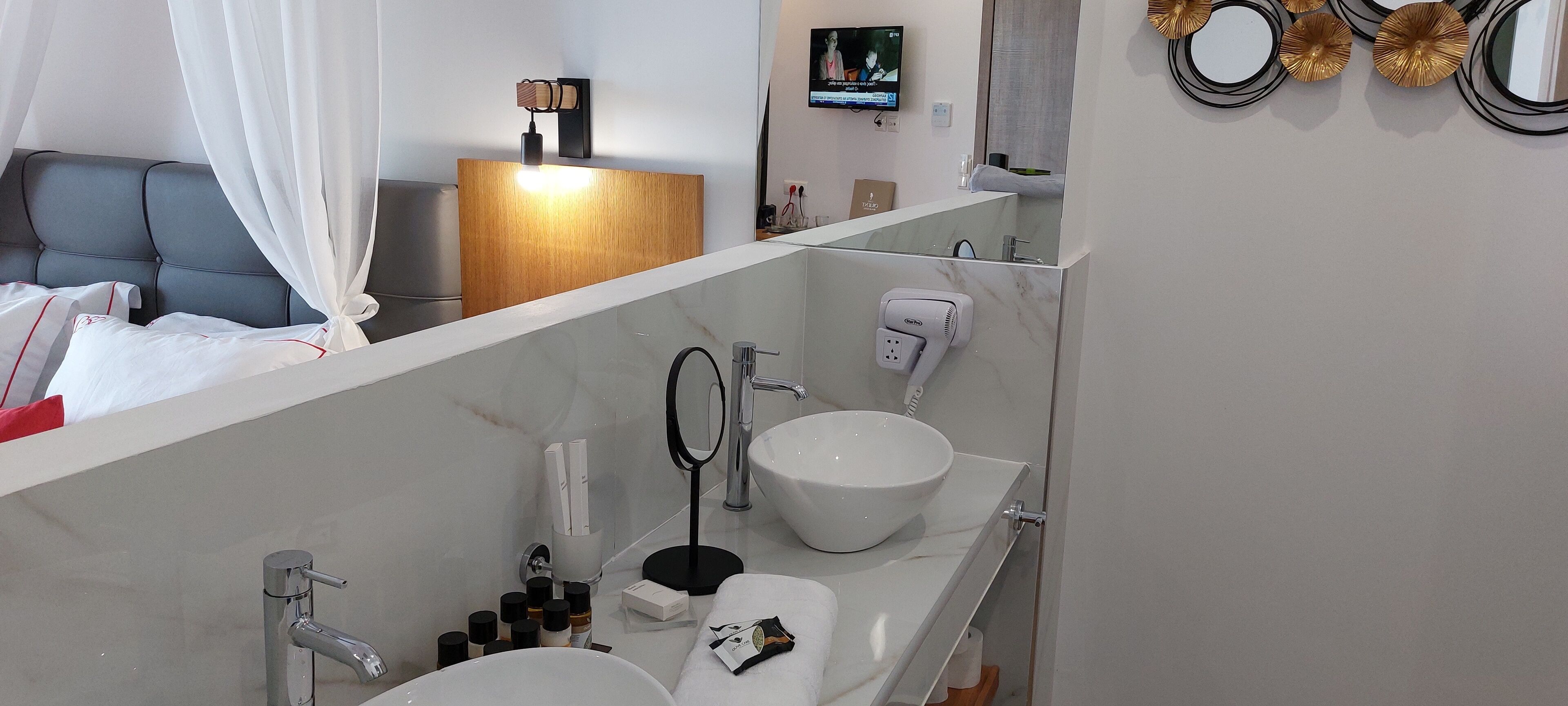 seaside honeymoon suite with private pool - euphoria | bathroom | shower, free toiletries, hair dryer, slippers