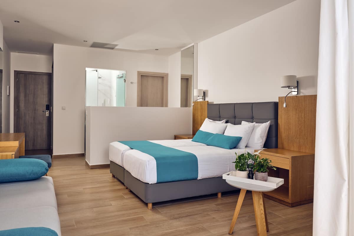 Junior Suite, Pool Access | 1 bedroom, Egyptian cotton sheets, premium bedding, down comforters