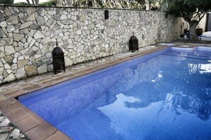 Seasonal outdoor pool, open 11:30 AM to 9:30 PM, sun loungers