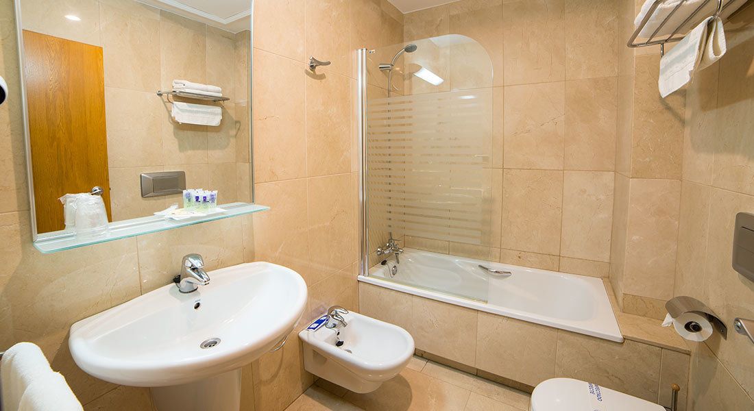 free toiletries, hair dryer, bidet, towels