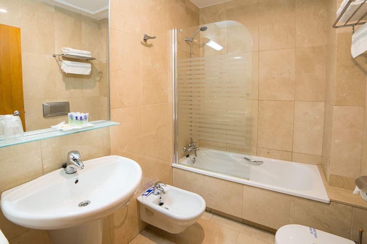 free toiletries, hair dryer, bidet, towels