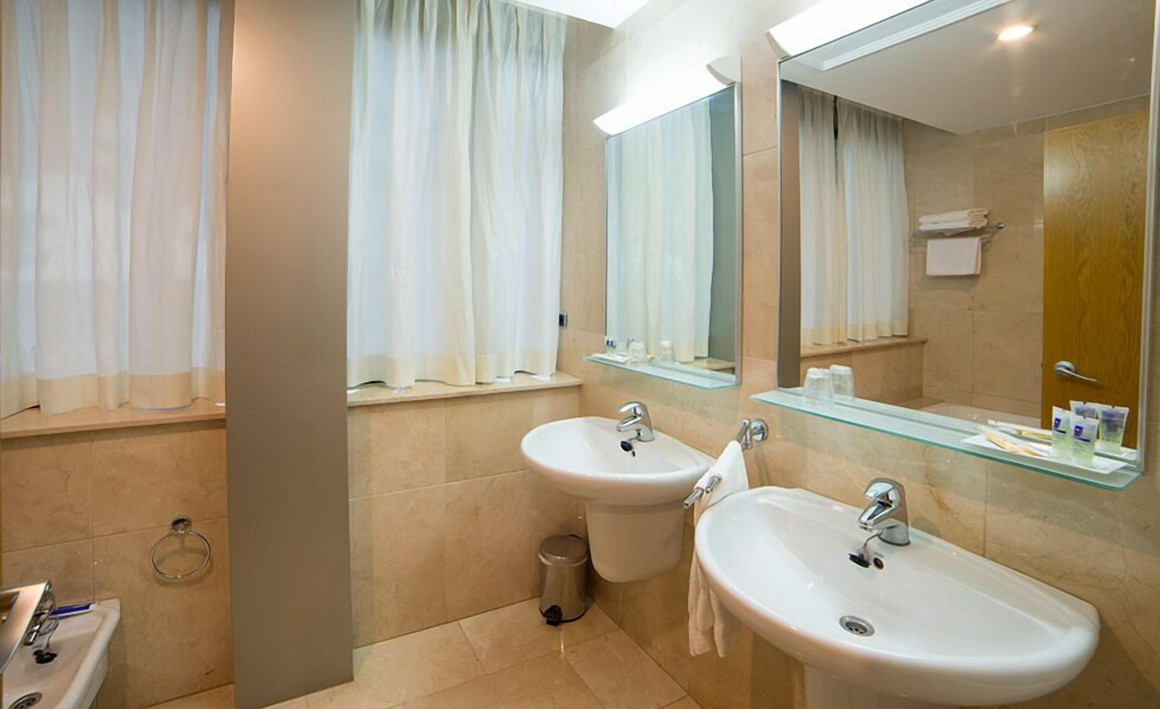 free toiletries, hair dryer, bidet, towels