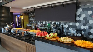 A buffet with various fruits and beverages. - Balta Hotel (Edirne)