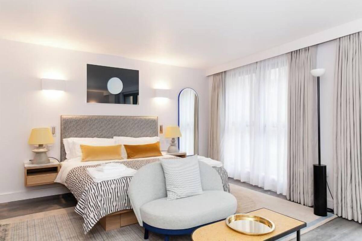 Egyptian cotton sheets, desk, laptop workspace, soundproofing
