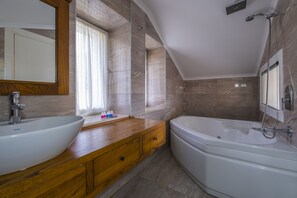 Luxury Villa, 4 Bedrooms | Bathroom | Separate tub and shower, jetted tub, hair dryer, towels
