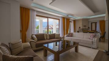 Villa, 5 Bedrooms (Olympia B2) | Living area | LCD TV