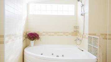 Separate tub and shower, jetted tub, hair dryer, towels