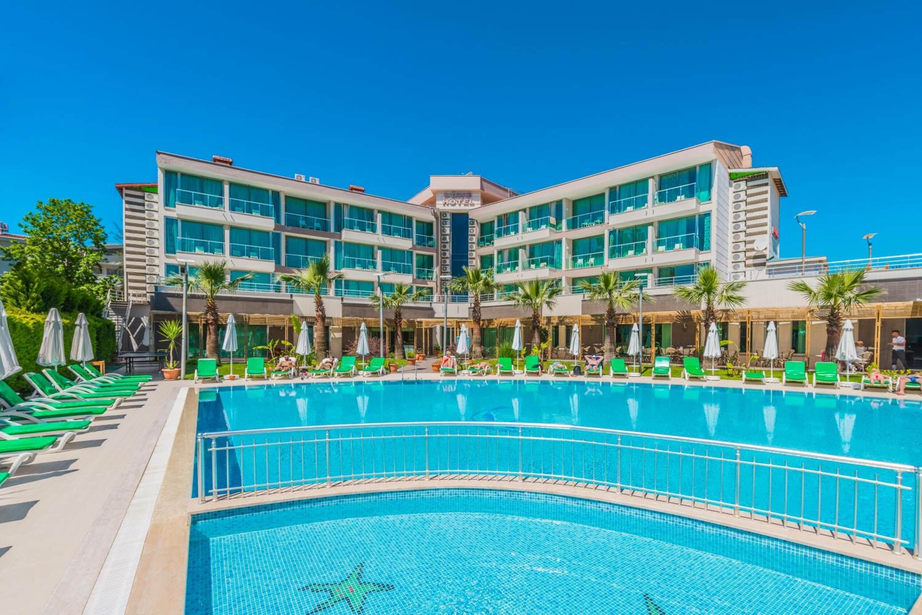 outdoor pool, pool umbrellas, pool loungers