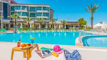 Outdoor pool, pool umbrellas, sun loungers