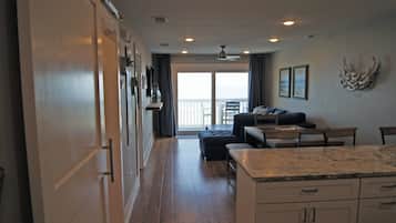 Condo, 2 Bedrooms | Living room | Flat-screen TV