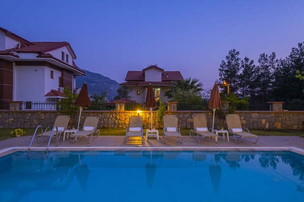 Seasonal outdoor pool, pool umbrellas, sun loungers