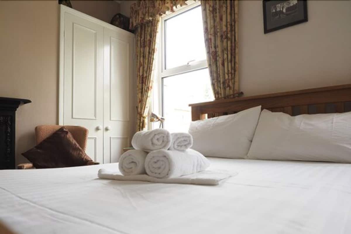 Premium bedding, iron/ironing board, cots/infant beds, free WiFi