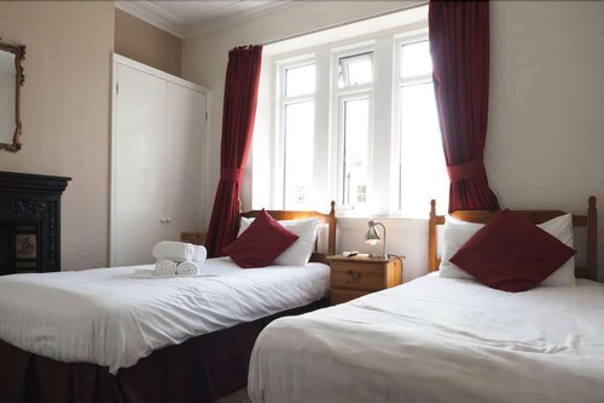 Premium bedding, iron/ironing board, cots/infant beds, free WiFi