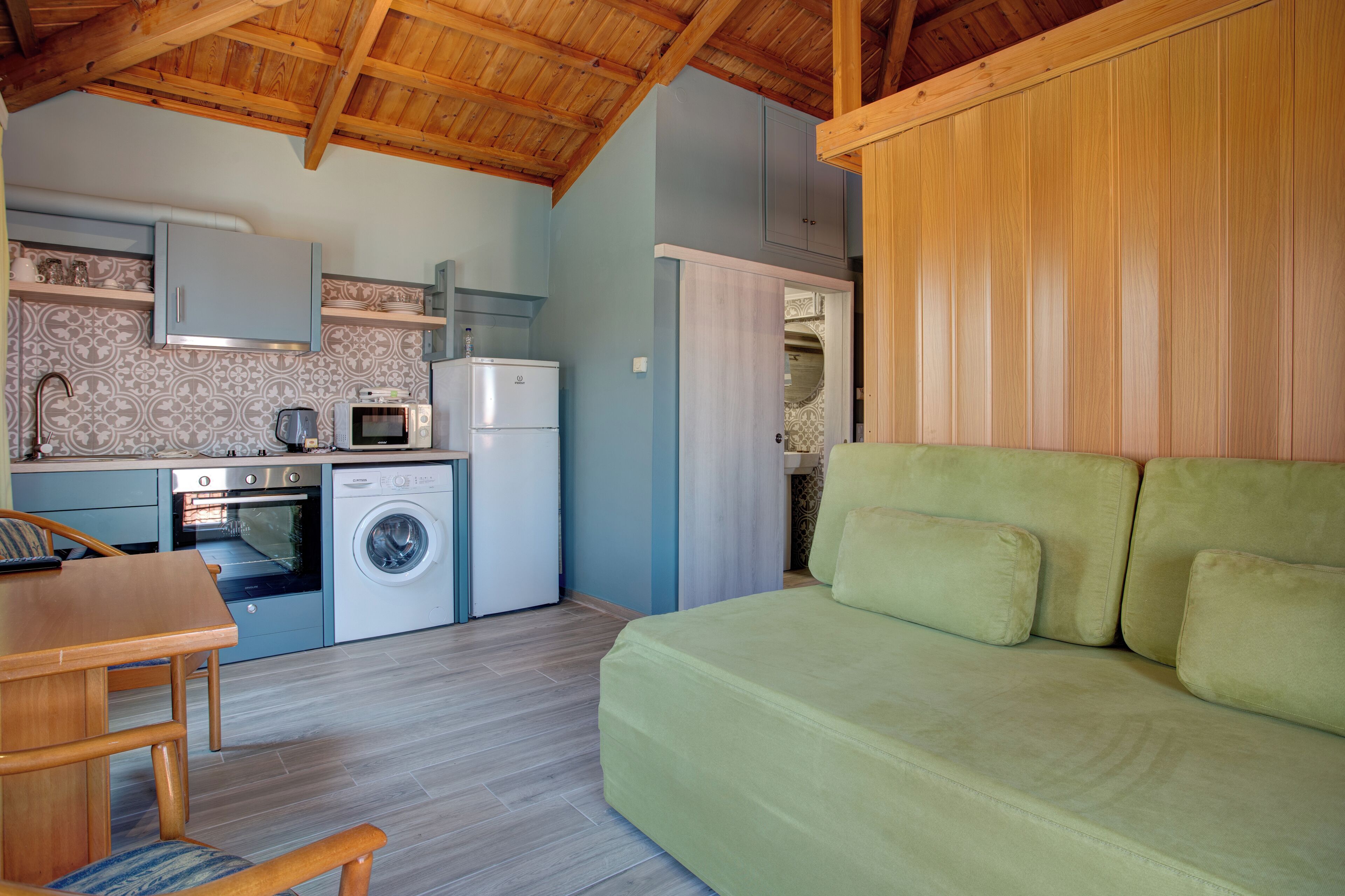 Deluxe Apartment, 1 Bedroom (B1) | Living area | Plasma TV