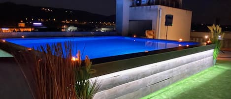 Seasonal outdoor pool, open 8:00 AM to 7:30 PM, sun loungers