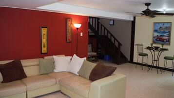Executive Villa, 1 Bedroom, Kitchen | Living area | 50-inch flat-screen TV with cable channels, TV, DVD player