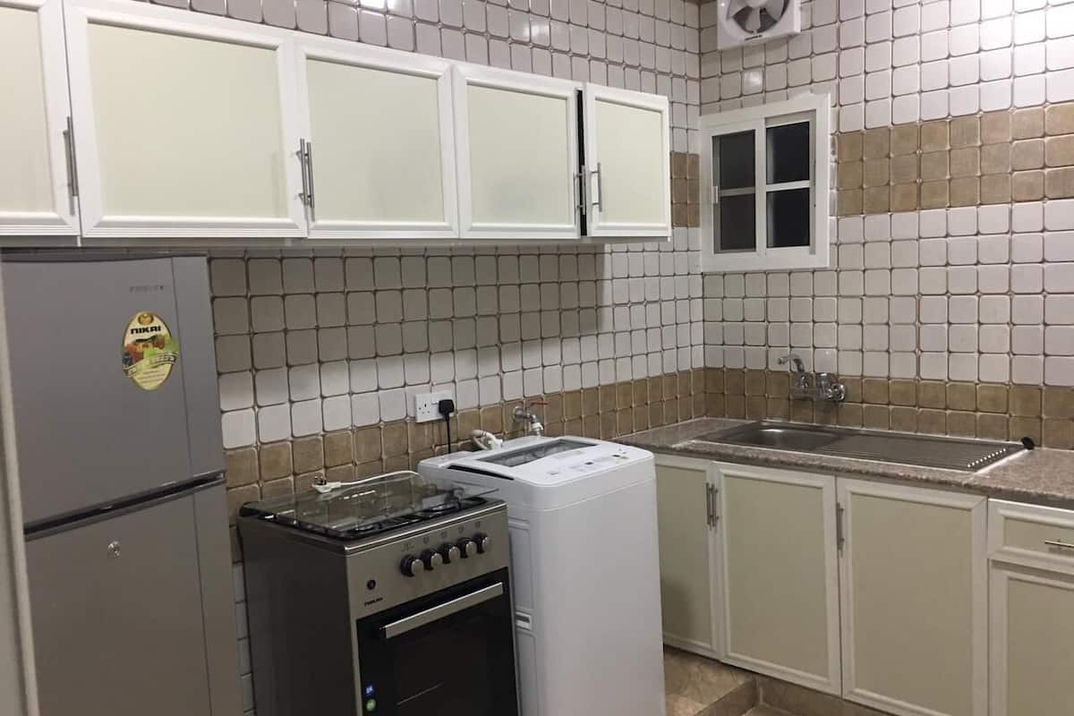 Departamento, 2 habitaciones | Cocina privada | Refrigerador con congelador, microondas y parrilla de estufa
