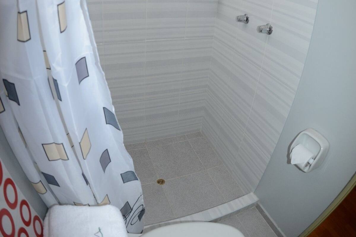 Appartement Familial, 3 chambres, 2 salles de bains | 1 chambre, fer et planche à repasser, Wi-Fi gratuit, draps fournis