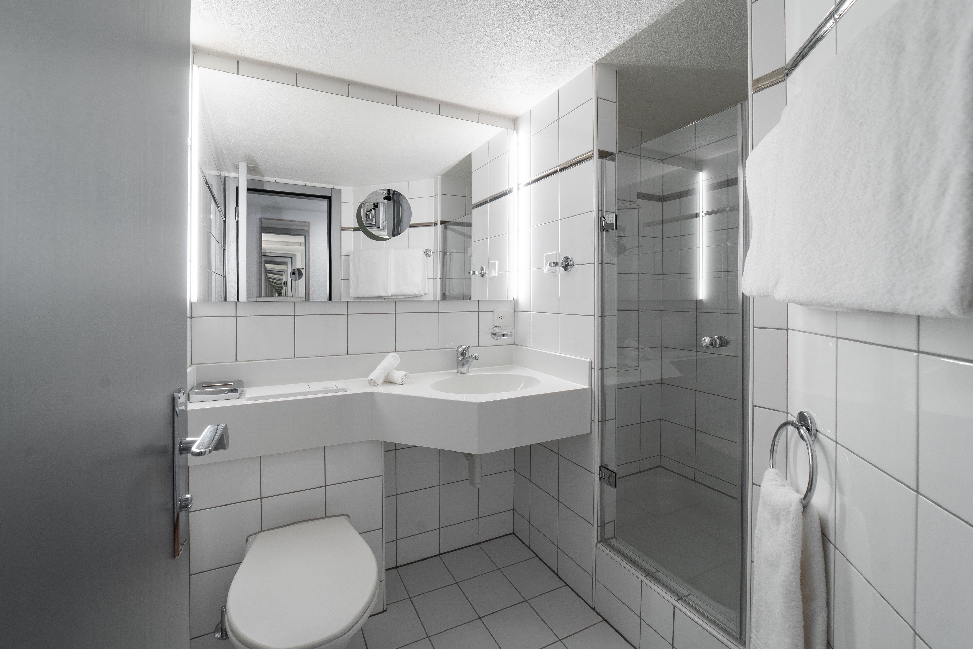 combined shower/bathtub, deep-soaking bathtub, hair dryer, bathrobes