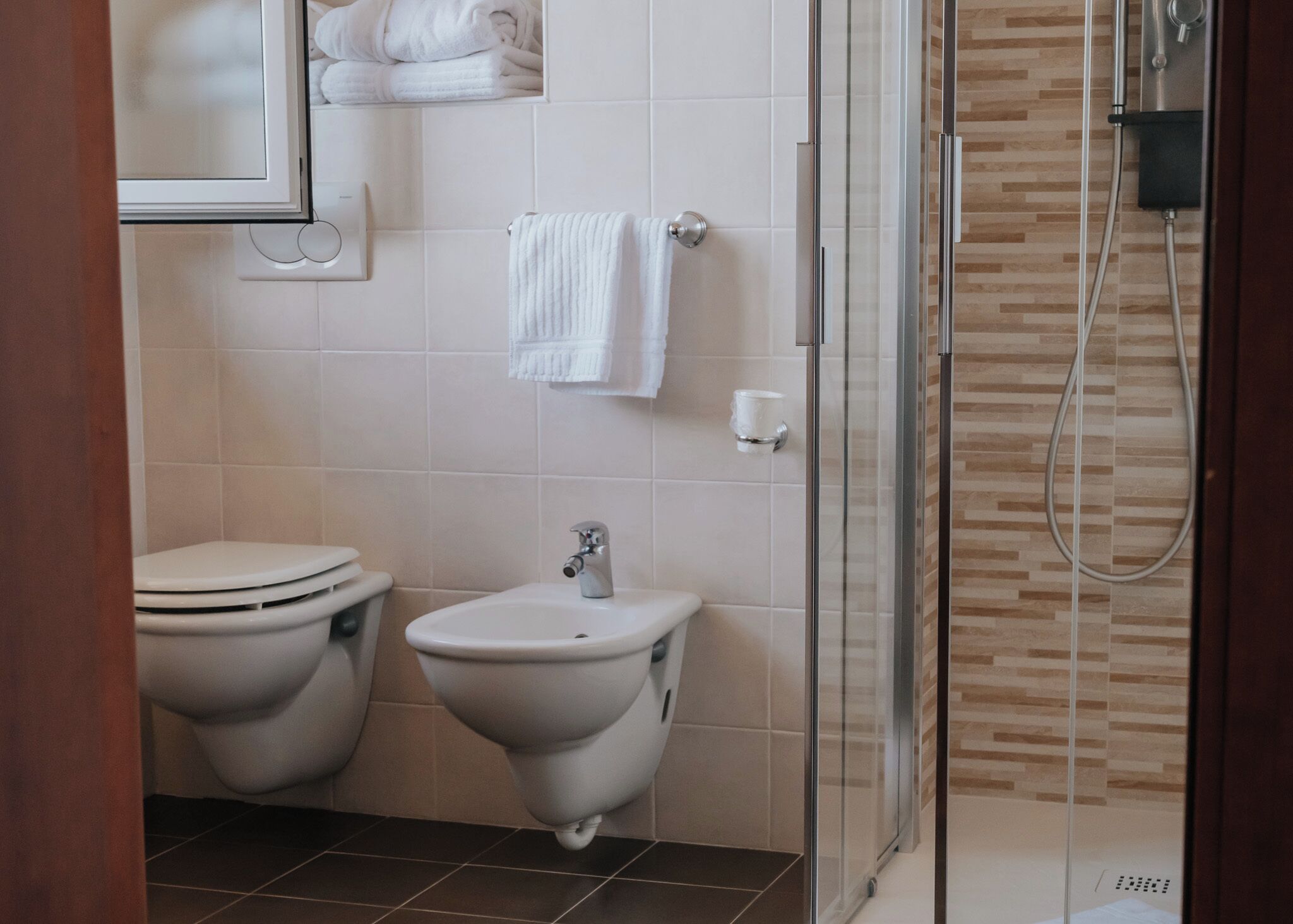 free toiletries, hair dryer, bidet, towels