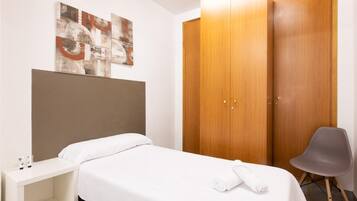 Desk, free WiFi, bed sheets