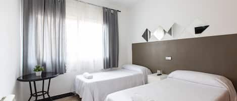 Basic Twin Room, Shared Bathroom | Desk, free WiFi, bed sheets