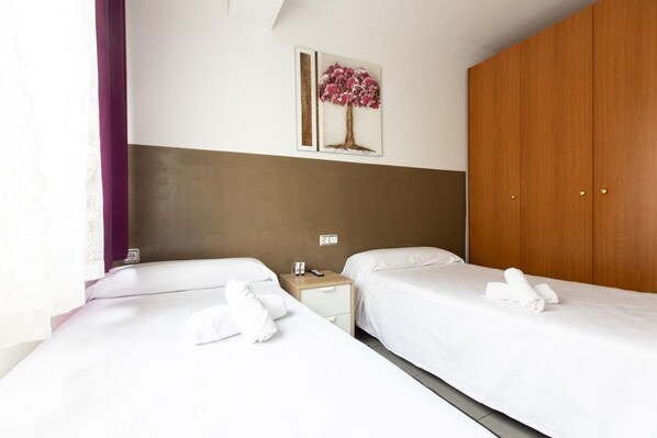 Desk, free WiFi, bed sheets