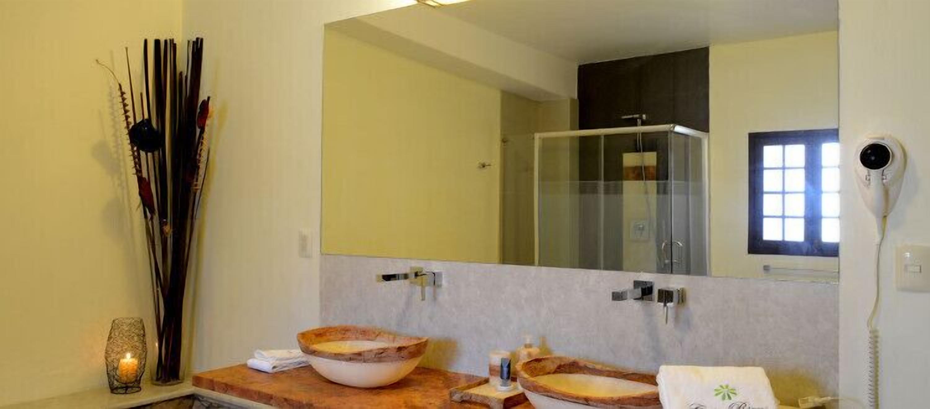 Suite Deluxe, 1 cama King size | Lavabo en el baño