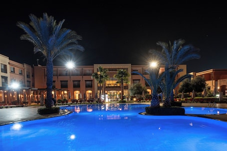 3 outdoor pools, pool umbrellas, pool loungers. Zephyr Hotel Club Resort and Spa