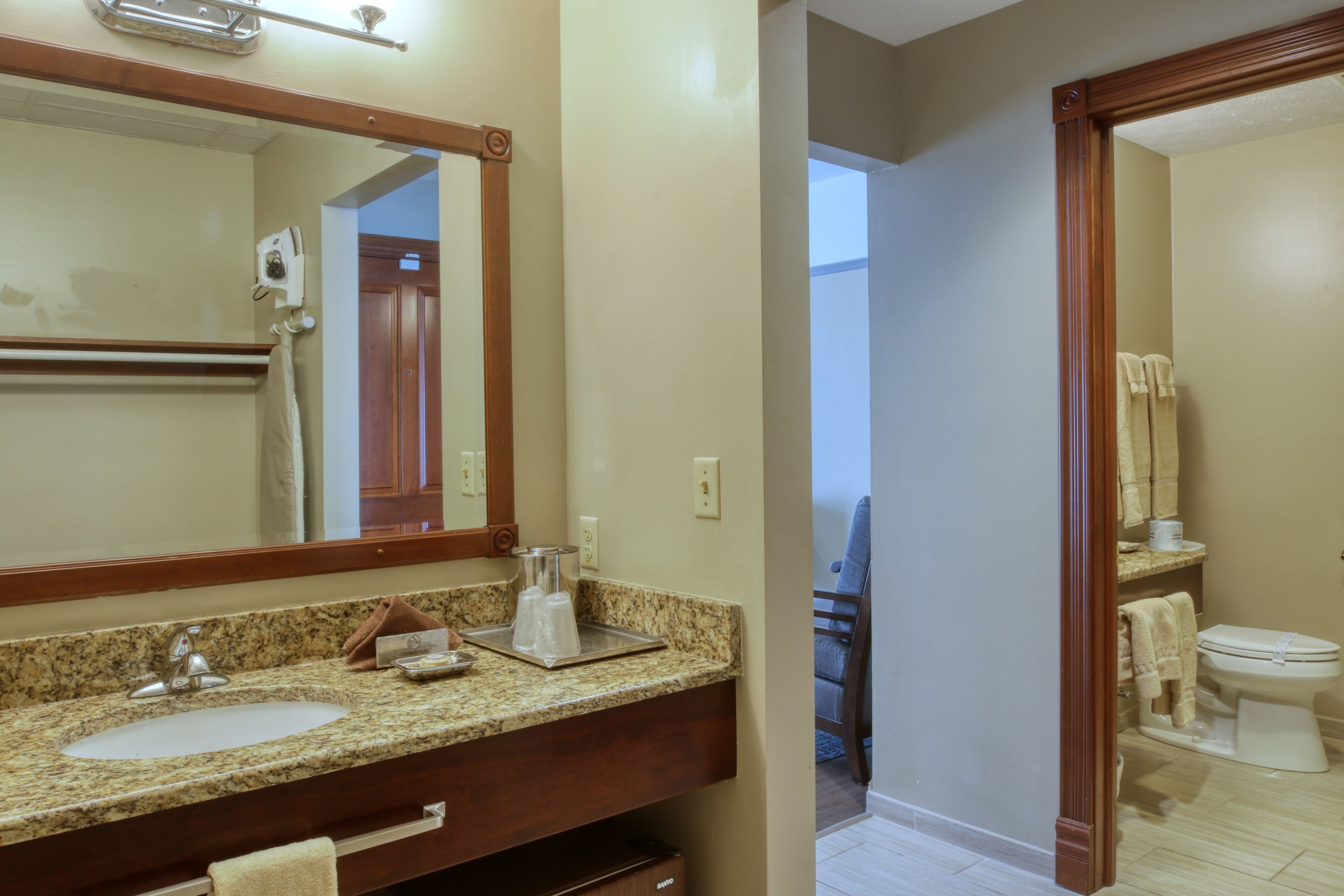 shower, designer toiletries, hair dryer, towels