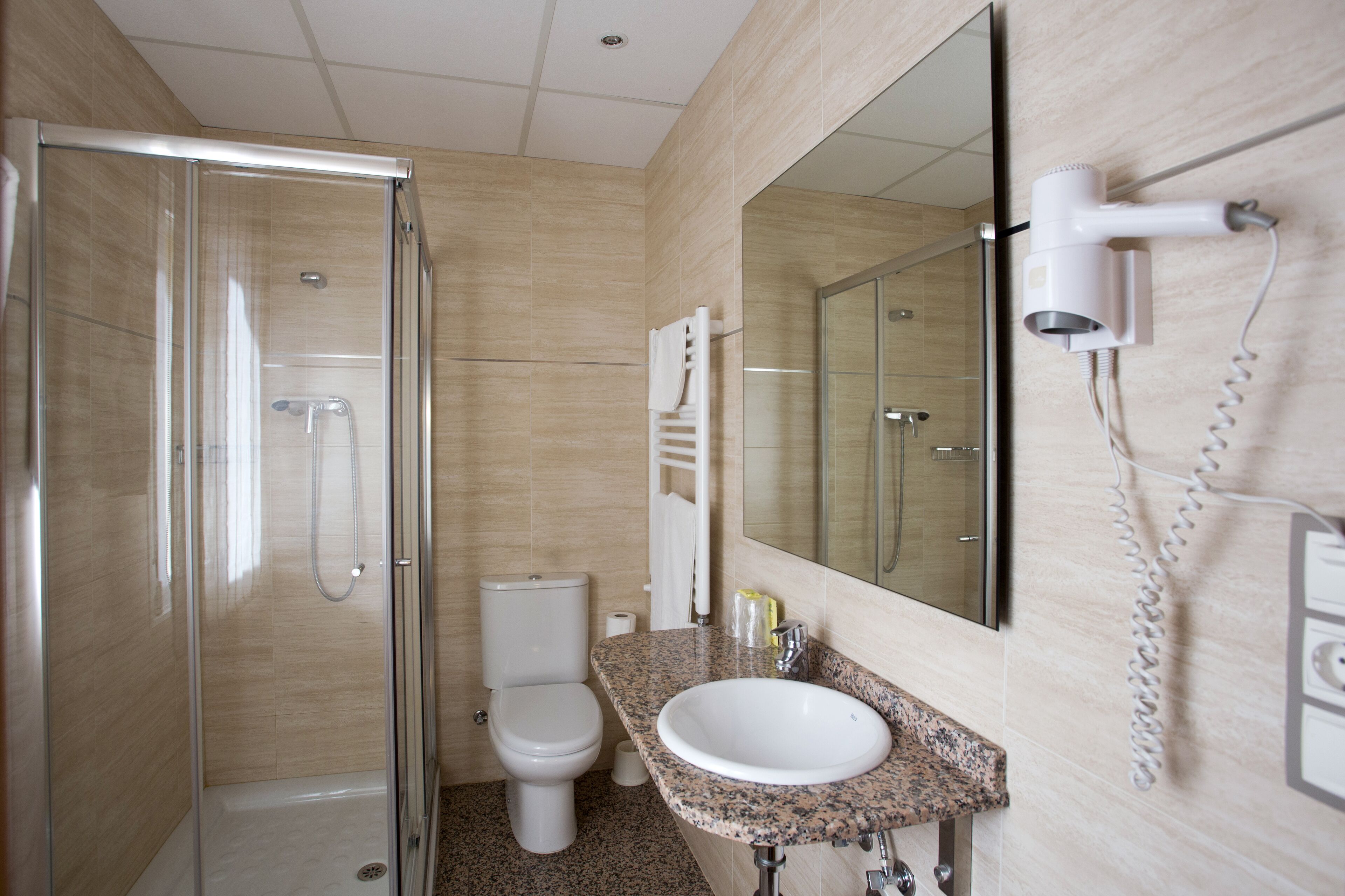 deep-soaking bathtub, free toiletries, hair dryer, towels