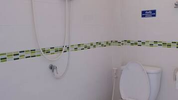 Shower, free toiletries, slippers, towels