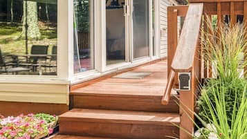 Step out onto the deck and enjoy the lush surroundings.