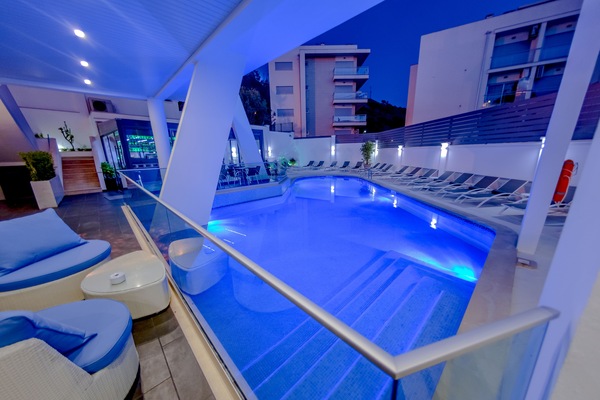 Outdoor pool, open 9 AM to 8 PM, pool umbrellas, sun loungers