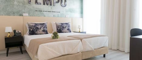 Minibar, coffres-forts dans les chambres, décoration personnalisée