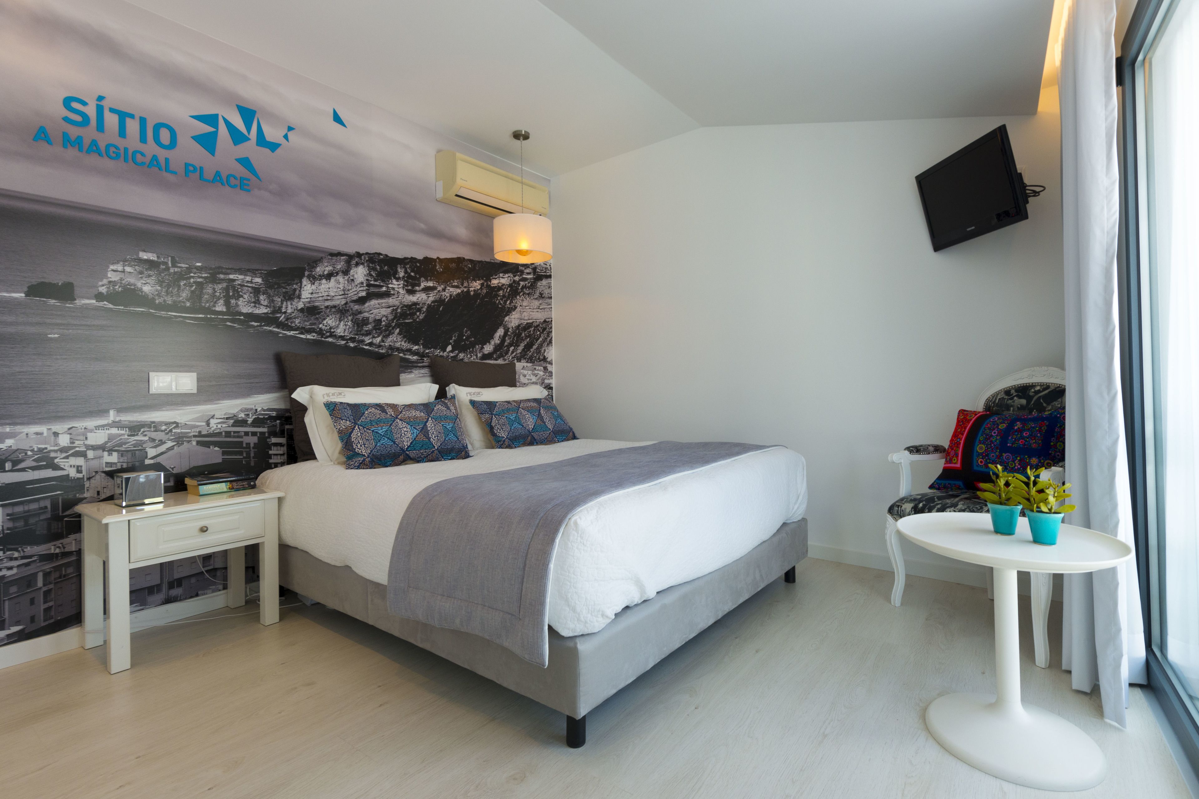 Doppel- oder Zweibettzimmer | Minibar, Zimmersafe, individuell dekoriert, Schreibtisch