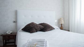Desk, blackout curtains, free WiFi, bed sheets