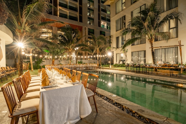 Outdoor pool, open 6:00 AM to 5:00 PM, pool loungers