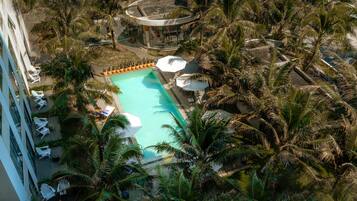 Outdoor pool, open 6:00 AM to 5:00 PM, pool loungers
