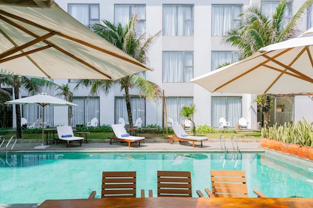 Outdoor pool, open 6:00 AM to 5:00 PM, sun loungers