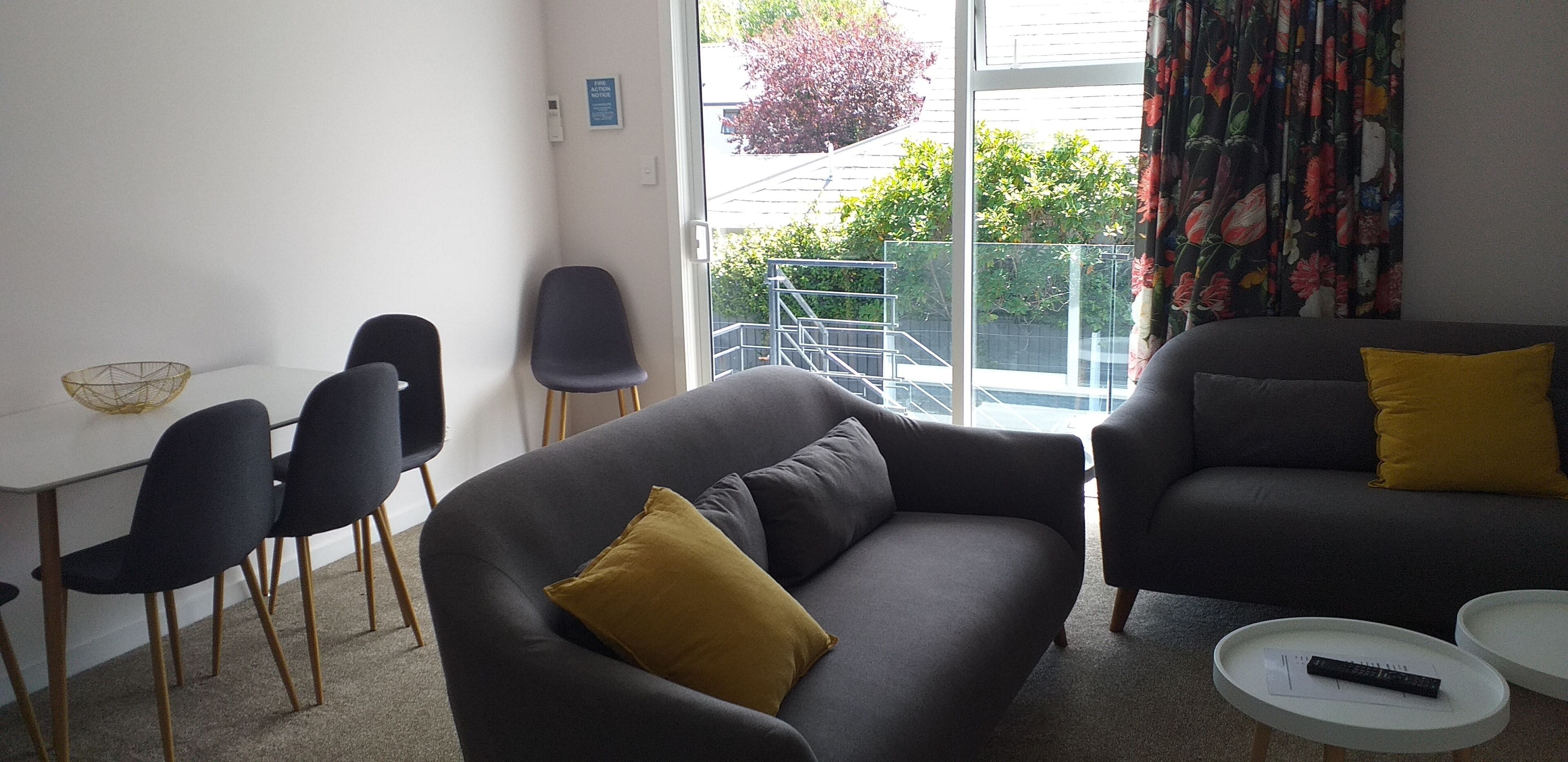 deluxe 2 bedroom unit | living area | flat-screen tv