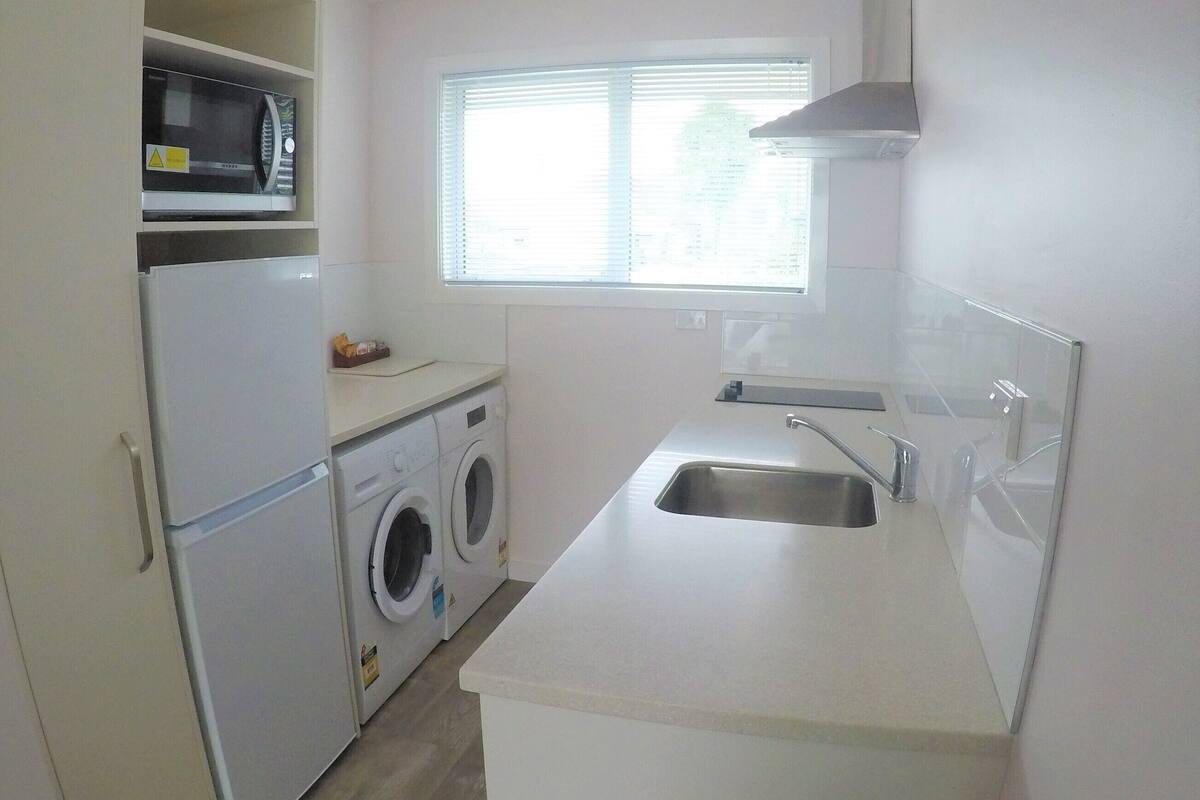 deluxe 2 bedroom unit | private kitchen | microwave, stovetop, coffee/tea maker, electric kettle