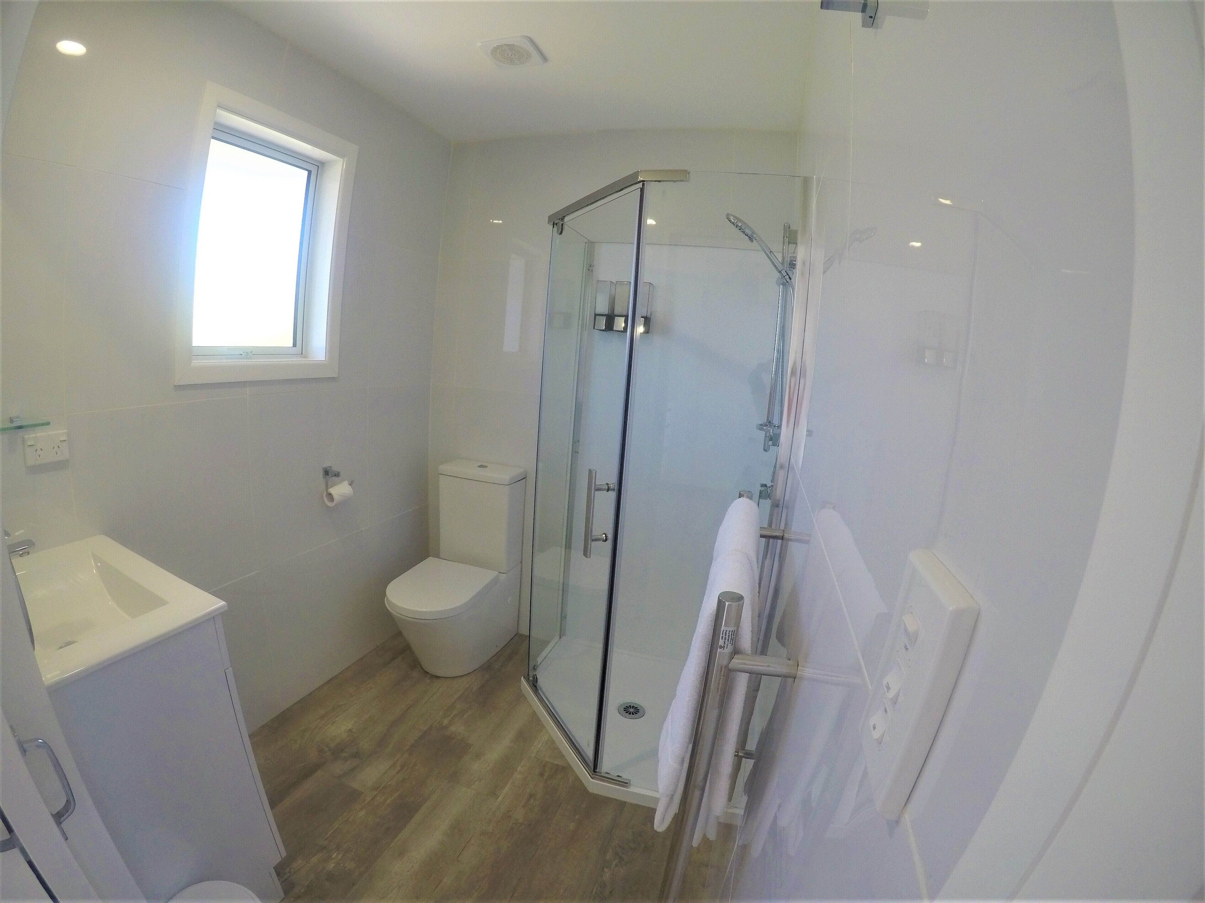 studio unit | bathroom | shower, free toiletries, hair dryer, towels