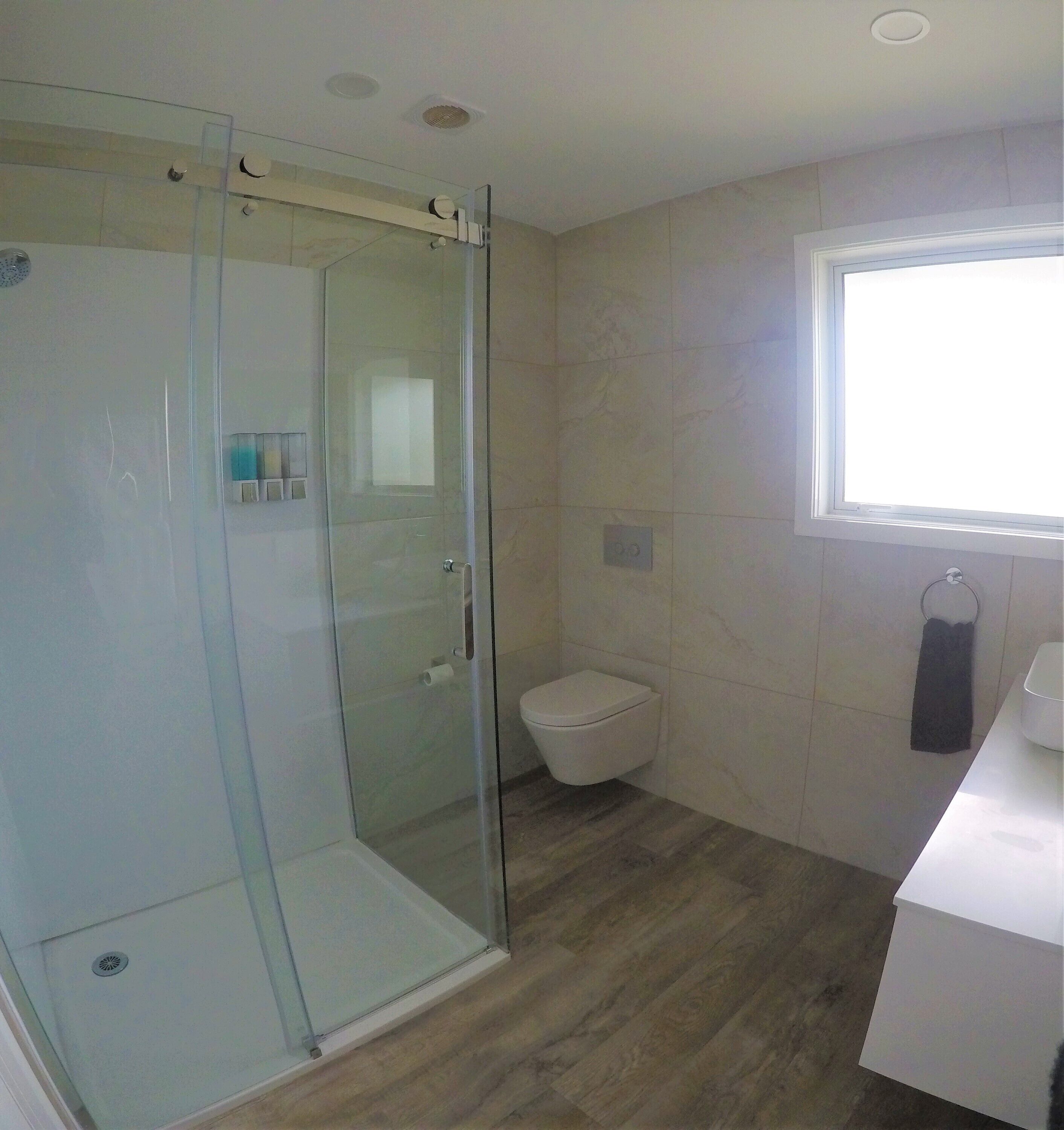 deluxe 2 bedroom unit | bathroom | shower, free toiletries, hair dryer, towels