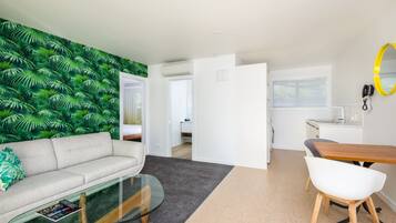 1 Bedroom Suite | Living area | Flat-screen TV