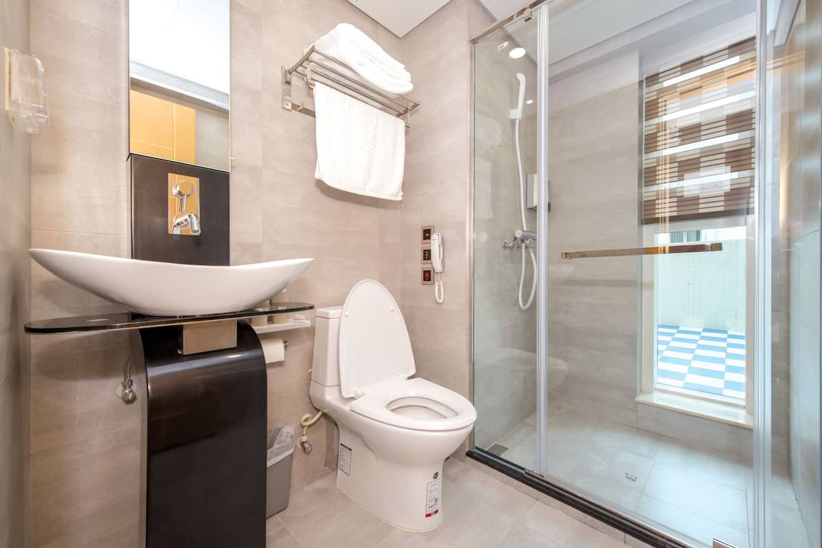 superior room | bathroom | shower, free toiletries, hair dryer, slippers