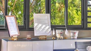 Breakfast, dinner served; international cuisine, pool views